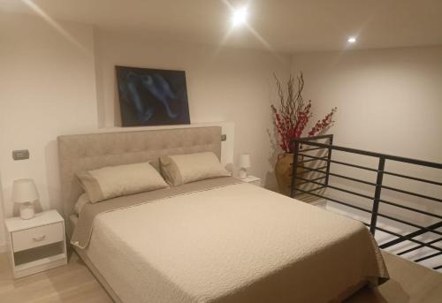 Ένα ή περισσότερα κρεβάτια σε δωμάτιο στο Casa Gioia