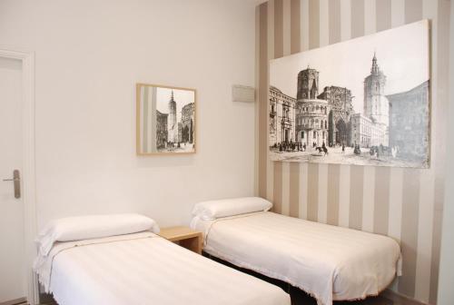 Postel nebo postele na pokoji v ubytování Hotel San Lorenzo Boutique