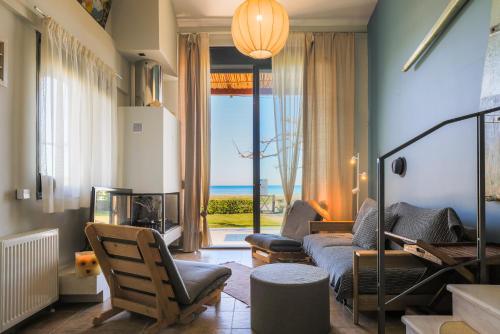 Pelagos Paradise Seafront Villa by Booking Kottas