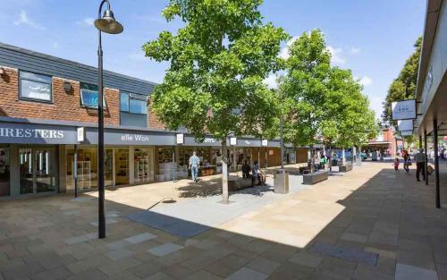an artists impression of the regeneration of a shopping street at Central Caversham Reading one bed flat in Reading
