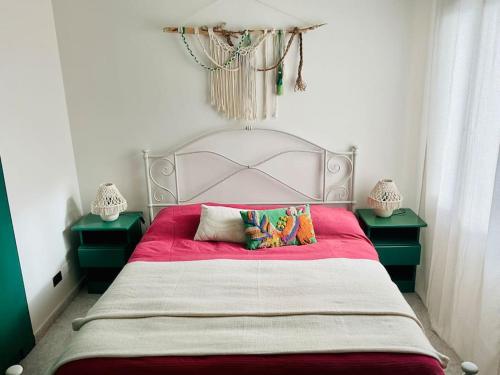Llit o llits en una habitació de Casa Oliva Alghero