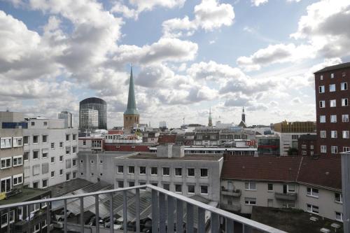- Balcón con vistas a la ciudad en PM-AM Apartments GmbH, en Dortmund