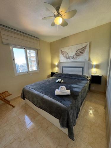 Postel nebo postele na pokoji v ubytování apartamento 5B MAR 2 1 dormitorio