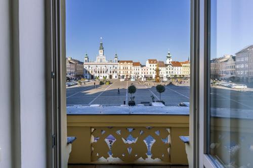 a view of a city from a window at Grandhotel Zvon in České Budějovice