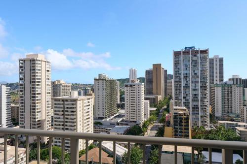 a view of a city skyline with tall buildings at OUTRIGGER Waikiki Paradise Hotel in Honolulu