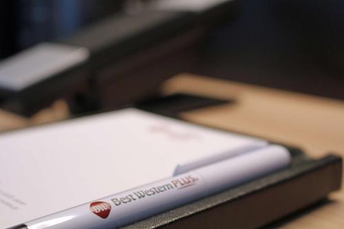 a close up of a book sitting on a desk at Best Western Plus Nagoya Sakae in Nagoya
