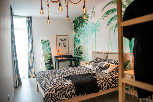 a bedroom with a zebra print wall with a bed at Urban Jungle in the City Center in Timişoara