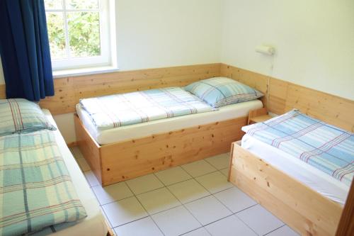 Säng eller sängar i ett rum på Ferienwohnung Ferienhäuser am Brocken, 60 qm 2 Schlafzimmer
