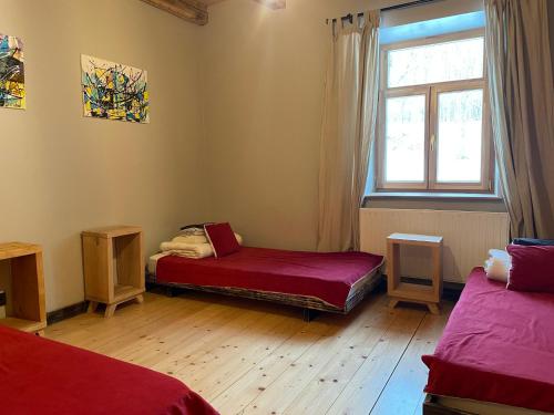 Ένα ή περισσότερα κρεβάτια σε δωμάτιο στο Inovatorių slėnis/ Innovators' valley