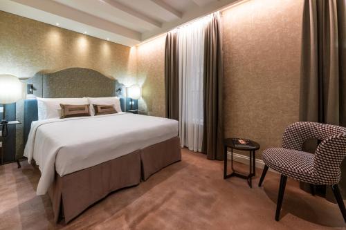 Voodi või voodid majutusasutuse Acca Hotel toas