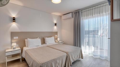 アルブフェイラにあるGuest House Dianamarのギャラリーの写真
