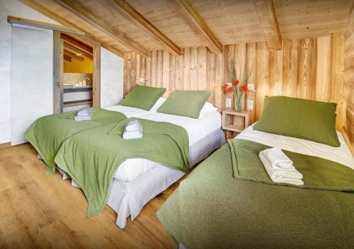 Ένα ή περισσότερα κρεβάτια σε δωμάτιο στο Chalet Nougat - Les Congères