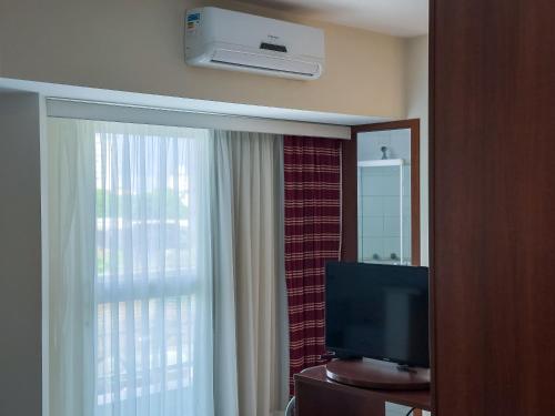 TV a/nebo společenská místnost v ubytování Hotel Cianorte Diamond