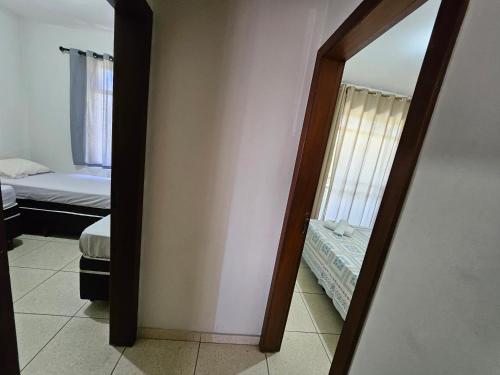 Postel nebo postele na pokoji v ubytování Hotel Avelar