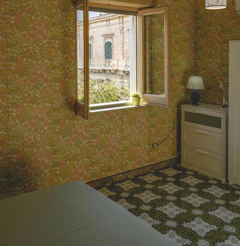 Katil atau katil-katil dalam bilik di Casa della Villa Pozzallo