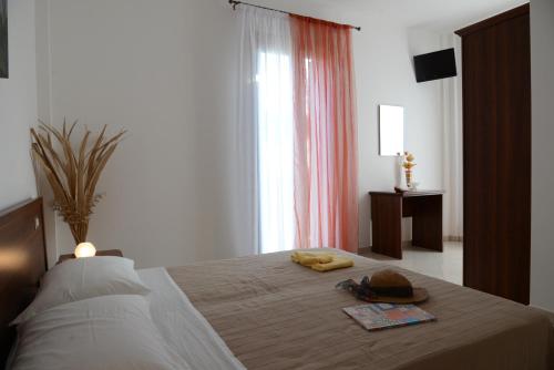 Ένα ή περισσότερα κρεβάτια σε δωμάτιο στο Agriturismo La Violetta