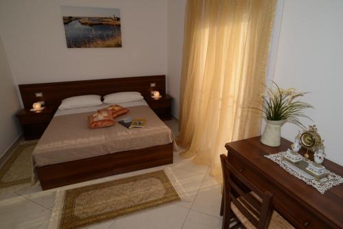 Ένα ή περισσότερα κρεβάτια σε δωμάτιο στο Agriturismo La Violetta