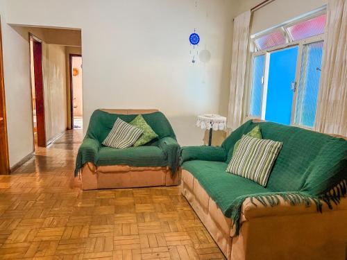 Area soggiorno di Ótima casa no centro de Carrancas