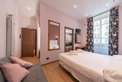 Postel nebo postele na pokoji v ubytování La Grande Bellezza Guest House Rome