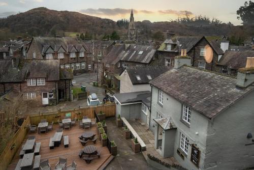 an aerial view of a town with buildings and a courtyard at The Temperance Inn, Ambleside - The Inn Collection Group in Ambleside