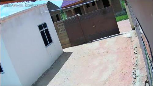 een uitzicht op een huis met een garage bij Home Boy Lodge in Dodoma