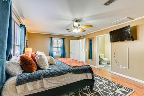 a bedroom with a bed and a ceiling fan at Spacious Starkville Home 4 Mi to MSU Campus in Starkville
