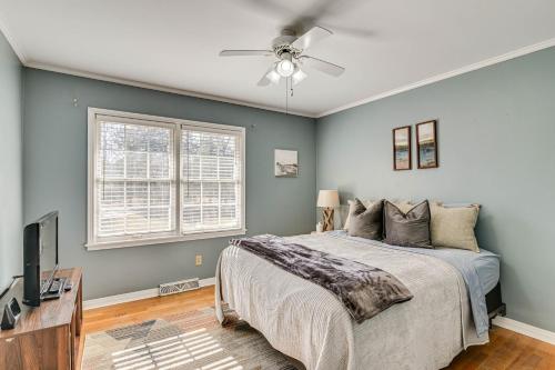 a bedroom with a bed and a ceiling fan at Spacious Starkville Home 4 Mi to MSU Campus in Starkville
