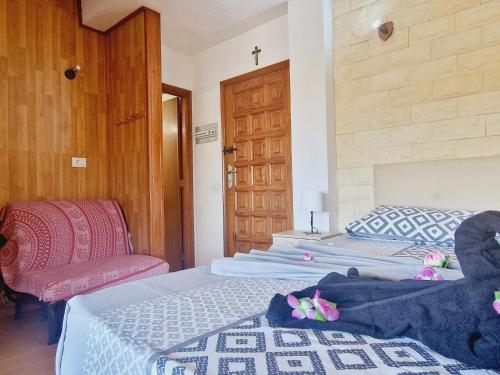 Postel nebo postele na pokoji v ubytování Small rooftop, Ocean view