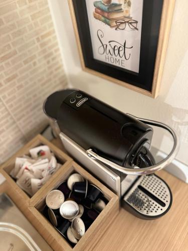 a toaster sitting on top of a kitchen counter at Sweet Home in Lissone