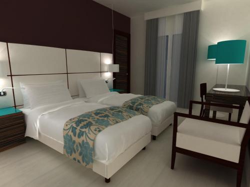Ένα ή περισσότερα κρεβάτια σε δωμάτιο στο Hotel Sagittario