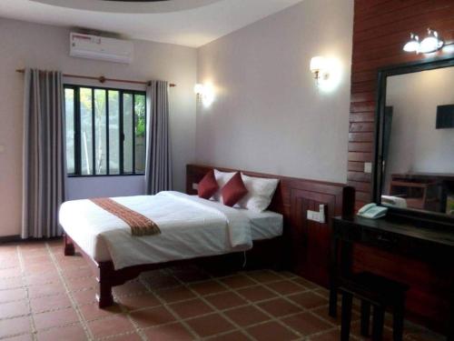 Katil atau katil-katil dalam bilik di Siem Reap lodge Eecfc Home Stay VSH