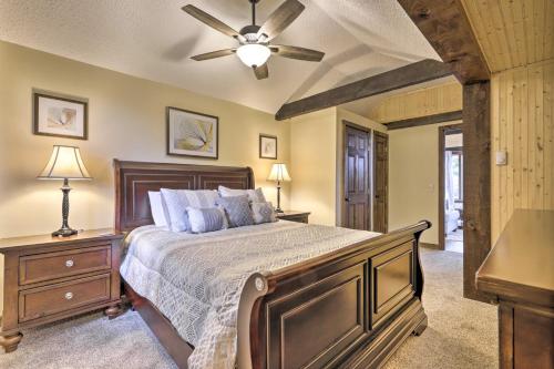 a bedroom with a bed and a ceiling fan at Private Guest House with Deck and Spectacular Views! in Uncasville