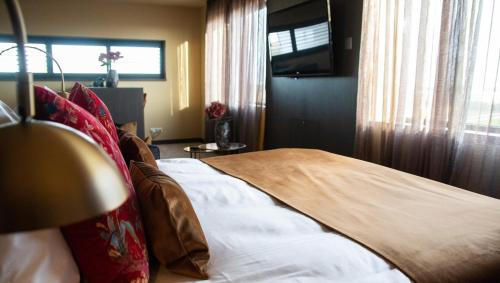 Letto o letti in una camera di Van der Valk Hotel Amersfoort-A1