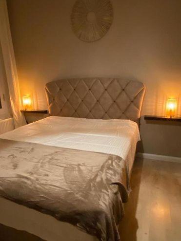 Una cama o camas en una habitación de B&B Nonne Blanche