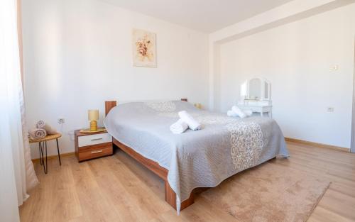 Postel nebo postele na pokoji v ubytování Apartment MIA