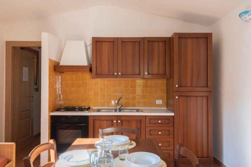 Køkken eller tekøkken på Apartments in Budoni 39547