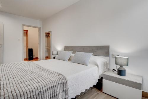 En eller flere senge i et værelse på Apartamento Larra by SanSe Holidays