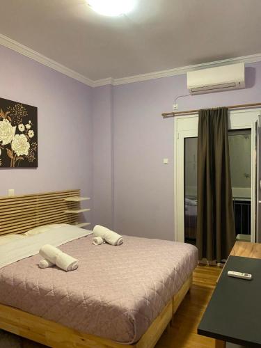 Ένα ή περισσότερα κρεβάτια σε δωμάτιο στο Kultur apartment Athens