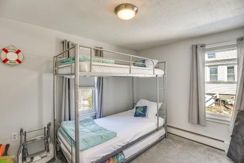 a bedroom with two bunk beds and a window at Downtown Westerly Home 4 Mi to Beaches! in Westerly