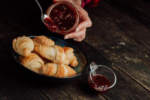 a bowl of croissants and a bowl of red sauce at Bed and Breakfast Kolo Adults only in Novigrad Istria