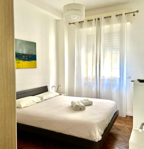 Katil atau katil-katil dalam bilik di Lovely 2 room apartment with small garden