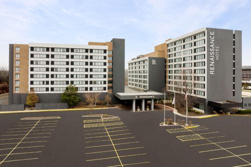 a rendering of two buildings in a parking lot at Renaissance Chicago North Shore Hotel in Northbrook