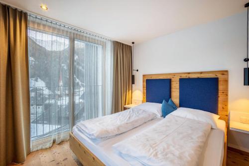 Ένα ή περισσότερα κρεβάτια σε δωμάτιο στο Stoana Apt 3-6