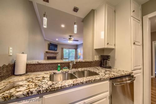 a kitchen with a sink and a counter top at The Float Inn 3 CW B209 in New Braunfels