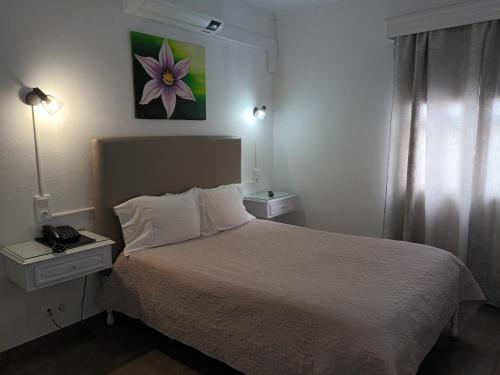 Hotel Branco Iにあるベッド