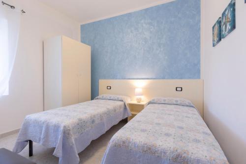 Postel nebo postele na pokoji v ubytování Casa Teo, Vista Mozzafiato a Lacona!