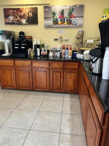 a counter in a coffee shop with a counter top at Days Inn by Wyndham Turlock in Turlock