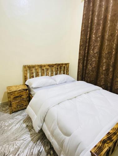 Een bed of bedden in een kamer bij Casa de la Luna