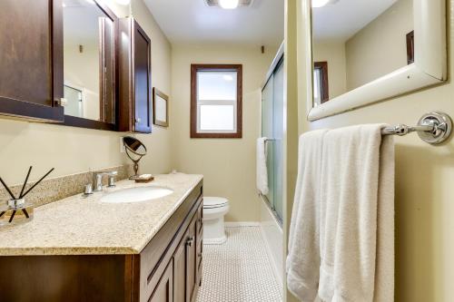 a bathroom with a sink and a toilet at Lakefront Glen Ellen Cabin with Views Near Wineries! in Glen Ellen