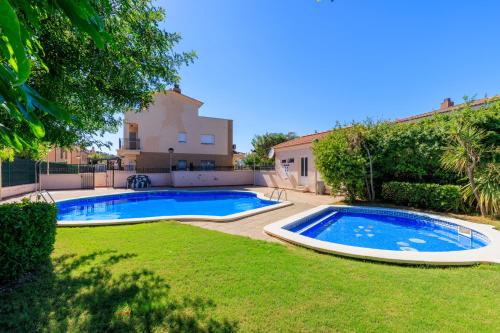 Foto Adosado con jardín en los Xalets de Salou 4